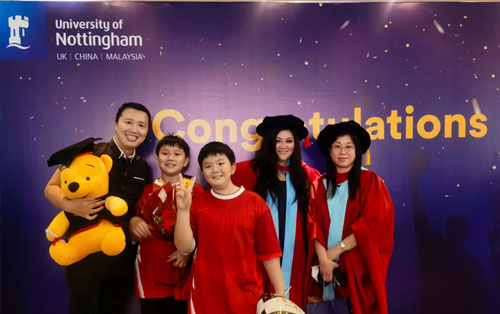 article-rebecca-tay-with-family