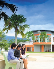 MBA students outside the Faculty of Arts & Social Sciences building