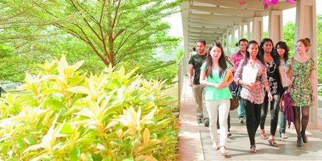 Undergraduate students walking along the walkway, Malaysia-campus