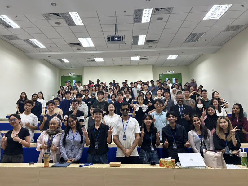 Group of new students participating in induction week events on campus.