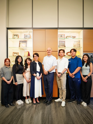 Prof Jane and student taking picture after the engagement session