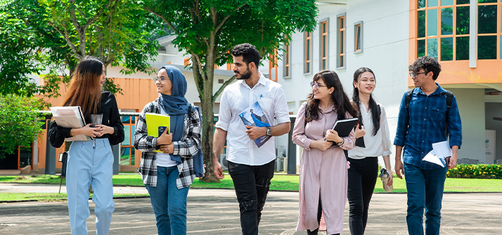 UNM student walking at campus area
