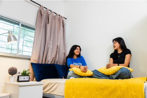Students enjoying a cosy and comfortable living space at University of Nottingham accommodation