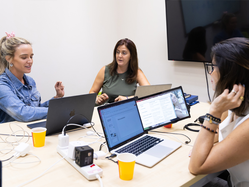 pace gallery woman discussing in room at UNM