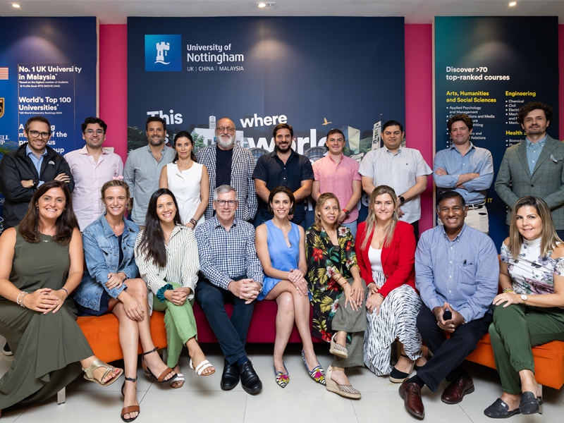 taking a group picture at UNM